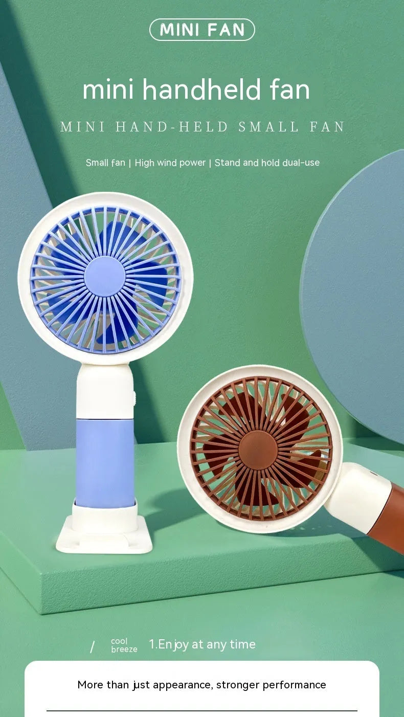Mini handheld fan with phone holder, plastic blades, USB rechargeable, 16x8x6cm size, pink colour option