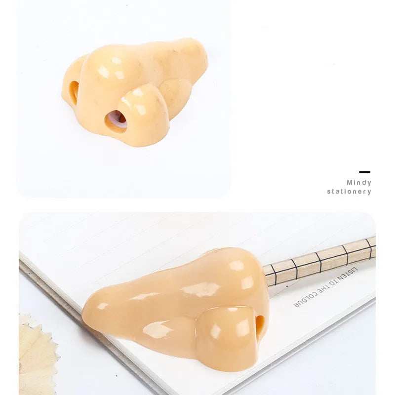 Flesh-coloured geometric pencil sharpener with a big hole for large pencils on a white background.
