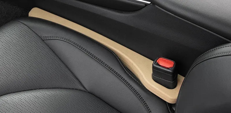 Car seat gap sealing strip in polyresin with integrated handle in four colour options