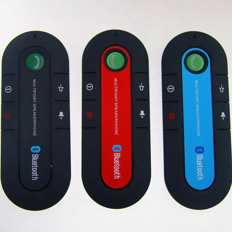 Black Bluetooth handsfree car kit with back clip, auxiliary cable, car charger and USB cable.