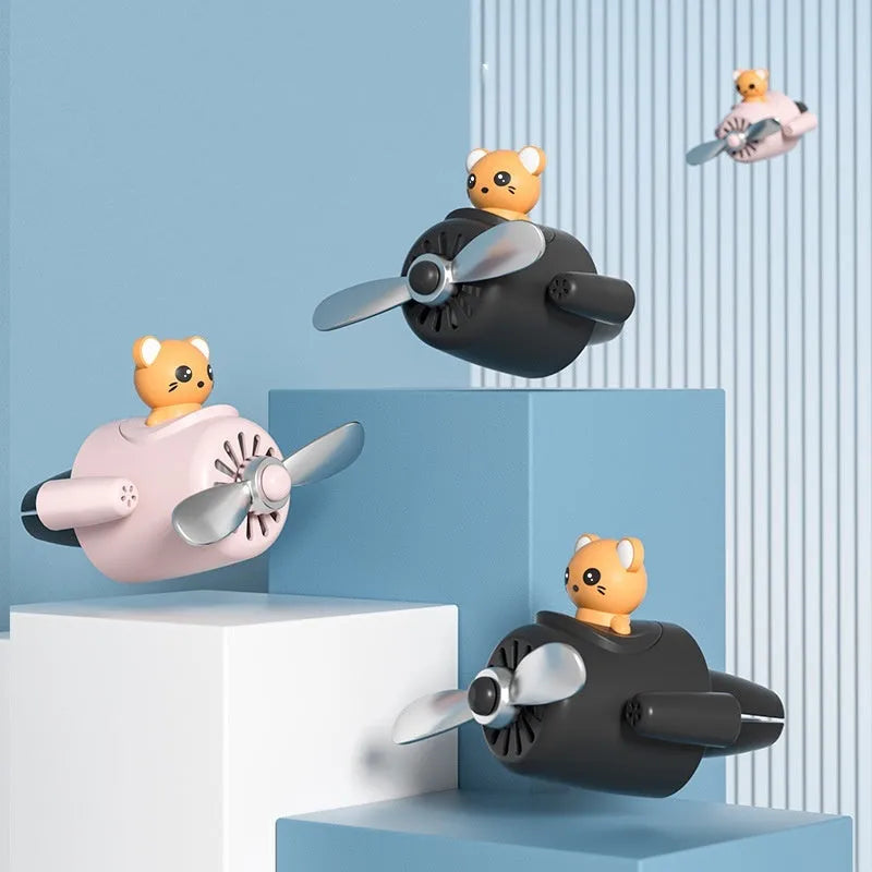 Cartoon airplane-shaped plastic car air vent aromatherapy clip in four colour options with fragrant slices.
