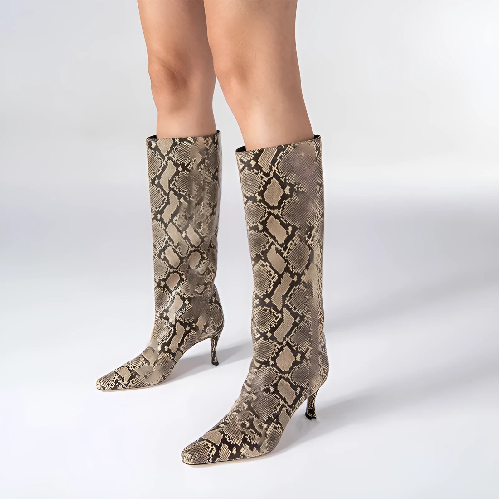Women's square toe cowboy boot in microfiber, shown in a selection of available colours and patterns.