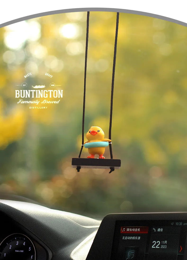 Yellow plastic duck doll car hanging ornament shown in four design variations.