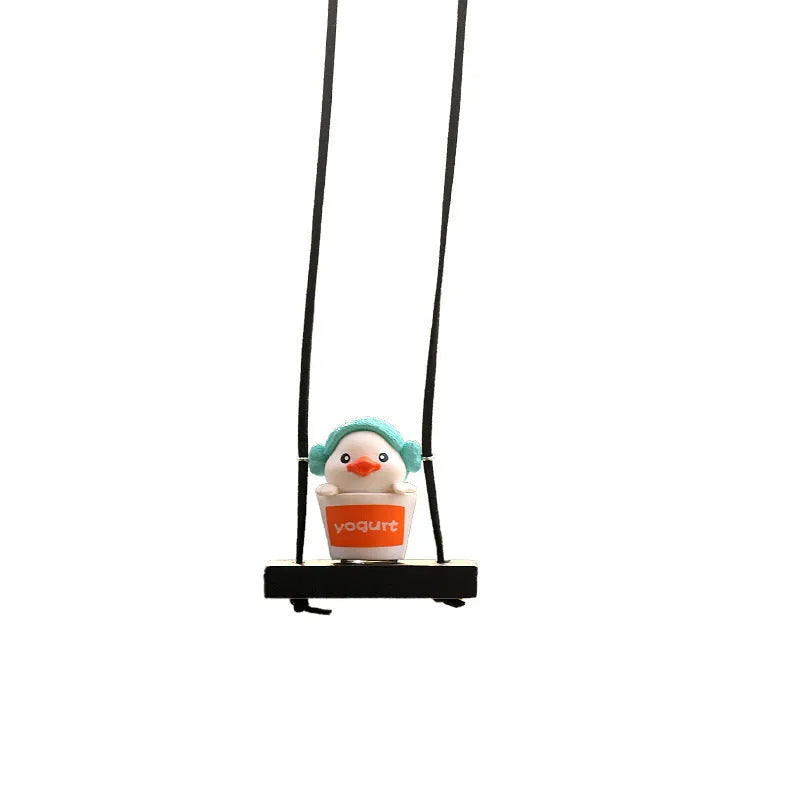 Yellow plastic duck doll car hanging ornament shown in four design variations.