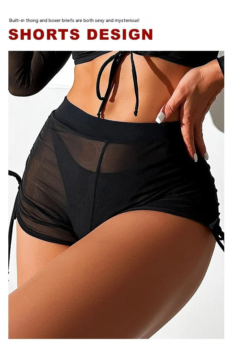 Black mesh women's four-piece bikini set with long sleeves for swimming