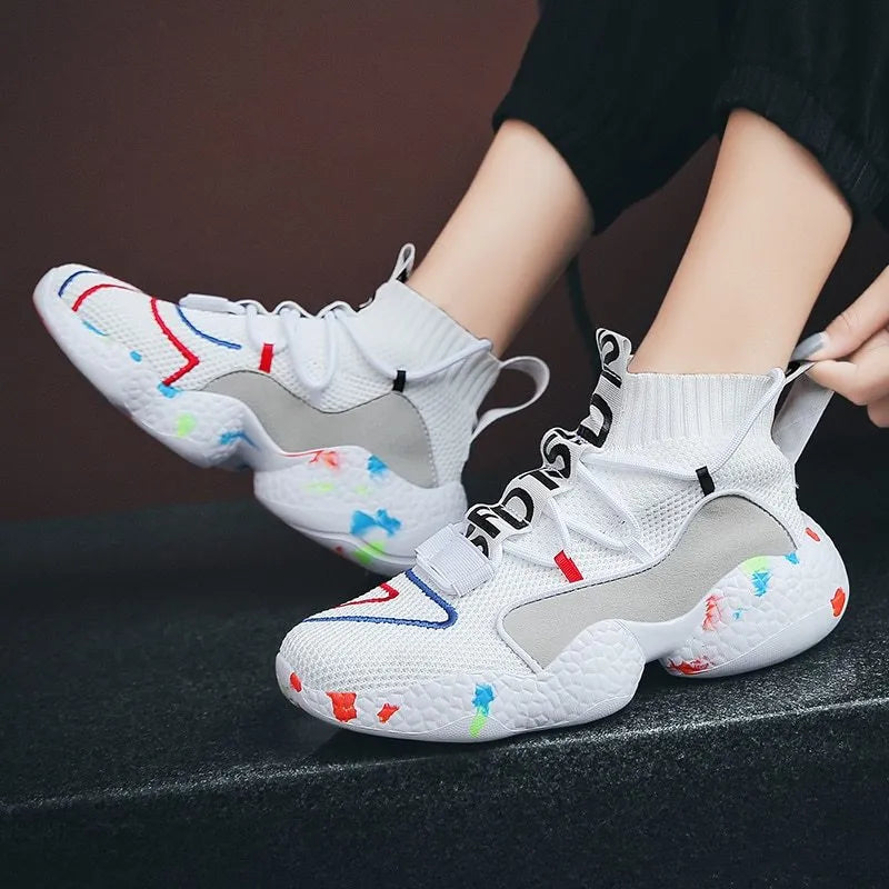 Men's camouflage pattern mesh sneakers with a flat rubber sole on a white background.