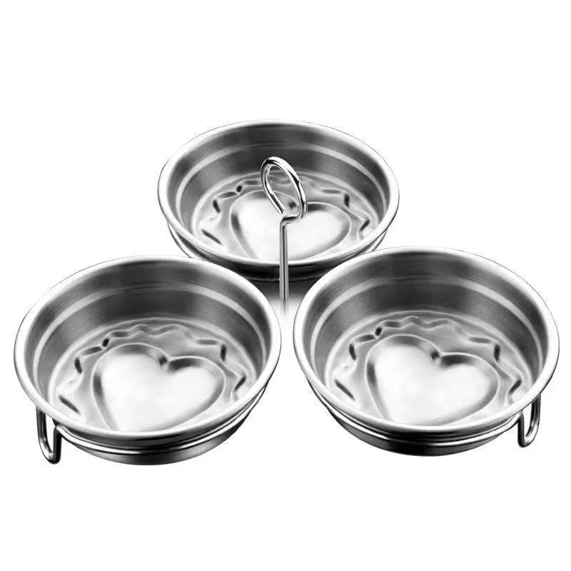Stainless steel heart-shaped egg steamer with round mould option for compact breakfast preparation