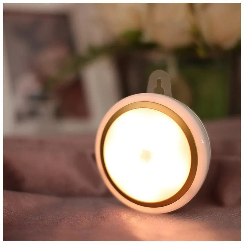 Circular white smart motion sensor LED light unit with a diameter of 80mm.