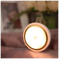 Circular white smart motion sensor LED light unit with a diameter of 80mm.