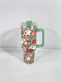 Christmas pattern stainless steel vacuum tumbler with handle, lid and straw showing 1200ml capacity measurements