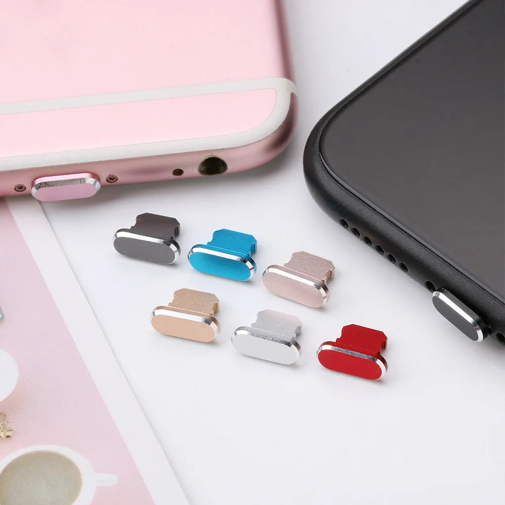 Aluminium alloy mobile phone charging port dust plug for iPhone, shown in multiple colours.