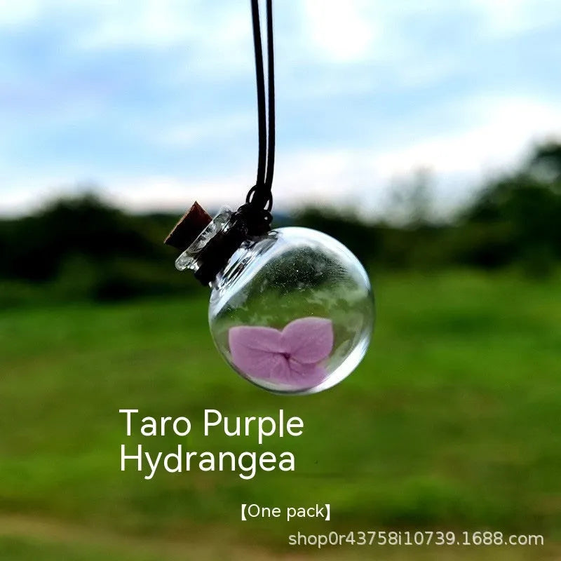 Glass car perfume pendant with preserved flowers in selected colour and diameter