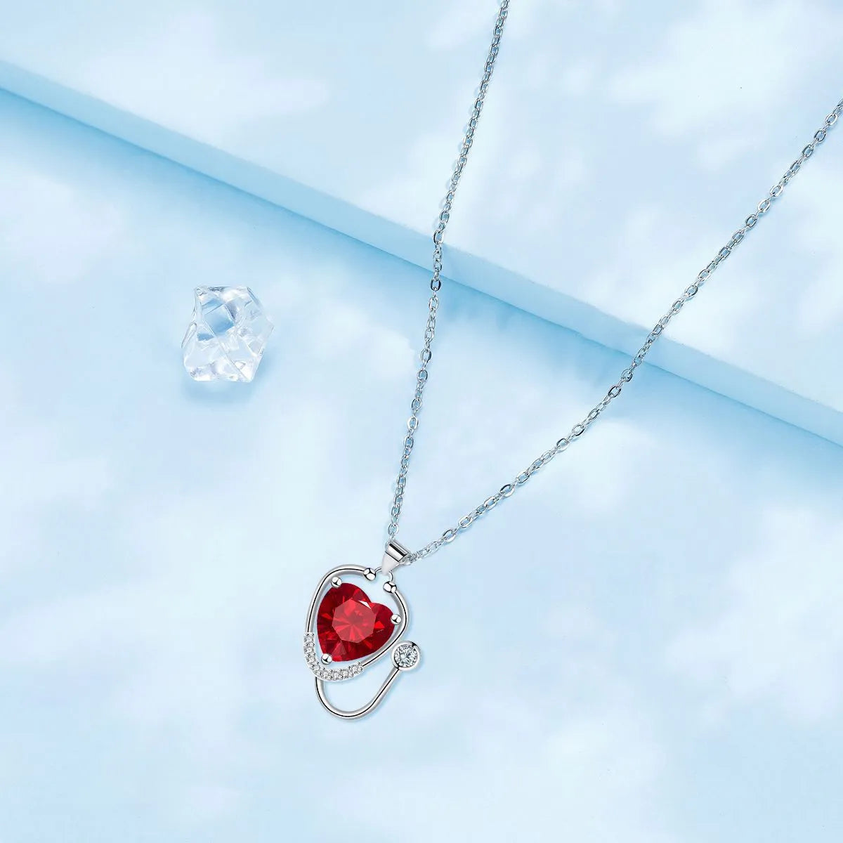 Women's copper stethoscope necklace with red diamond electroplated finish