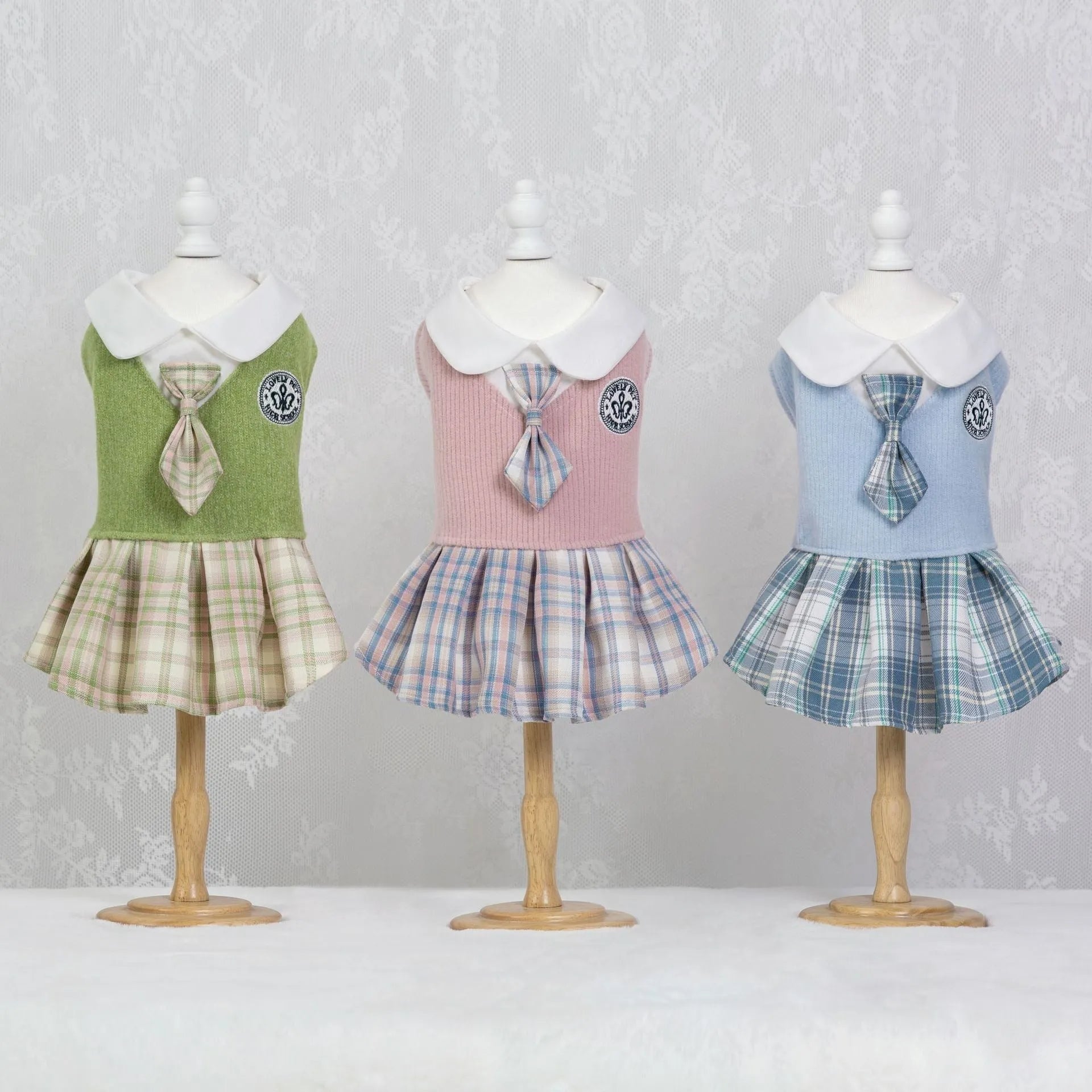 A pink, blue, or green tartan skirt for dogs or cats in a princess style.