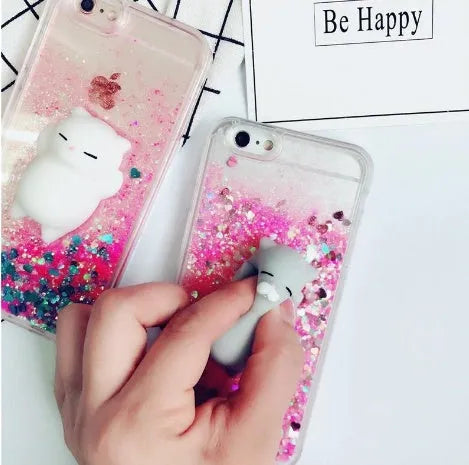 A glittery cat-themed phone case on an iPhone, showing the camera and port cut-outs.