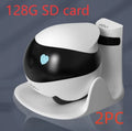 White mobile robot surveillance camera on a charging dock.