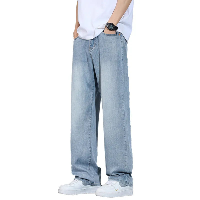Straight-leg casual trousers in denim fabric with wide-leg design and zip fly opening