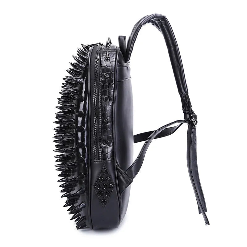 Black oval punk style women's backpack made of PU leather with air cushion straps and open pockets.