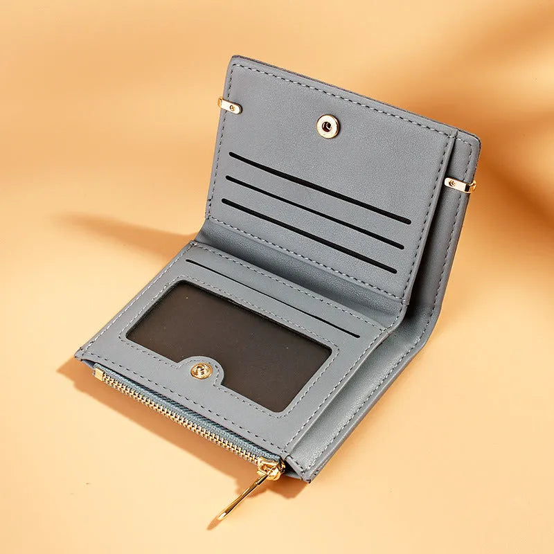 PU leather ladies wallet with zipper closure showing multiple card slots and compact fold design