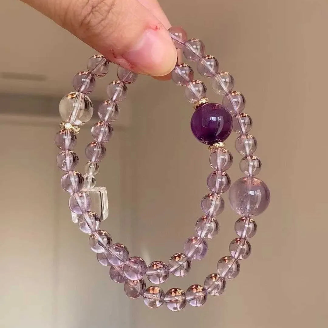 Women's U-shaped artificial amethyst bracelet with pearl and four-leaf clover charm on wrist