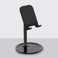 Silver white aluminium alloy mobile phone desktop stand holding a smartphone at an adjustable angle