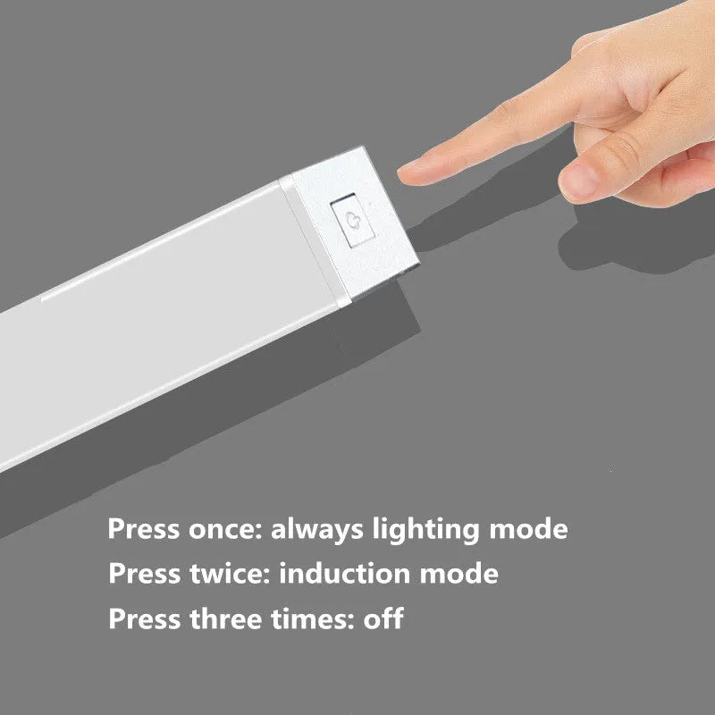 Silver aluminium LED closet light with motion sensor and magnetic back, shown illuminating a wardrobe.