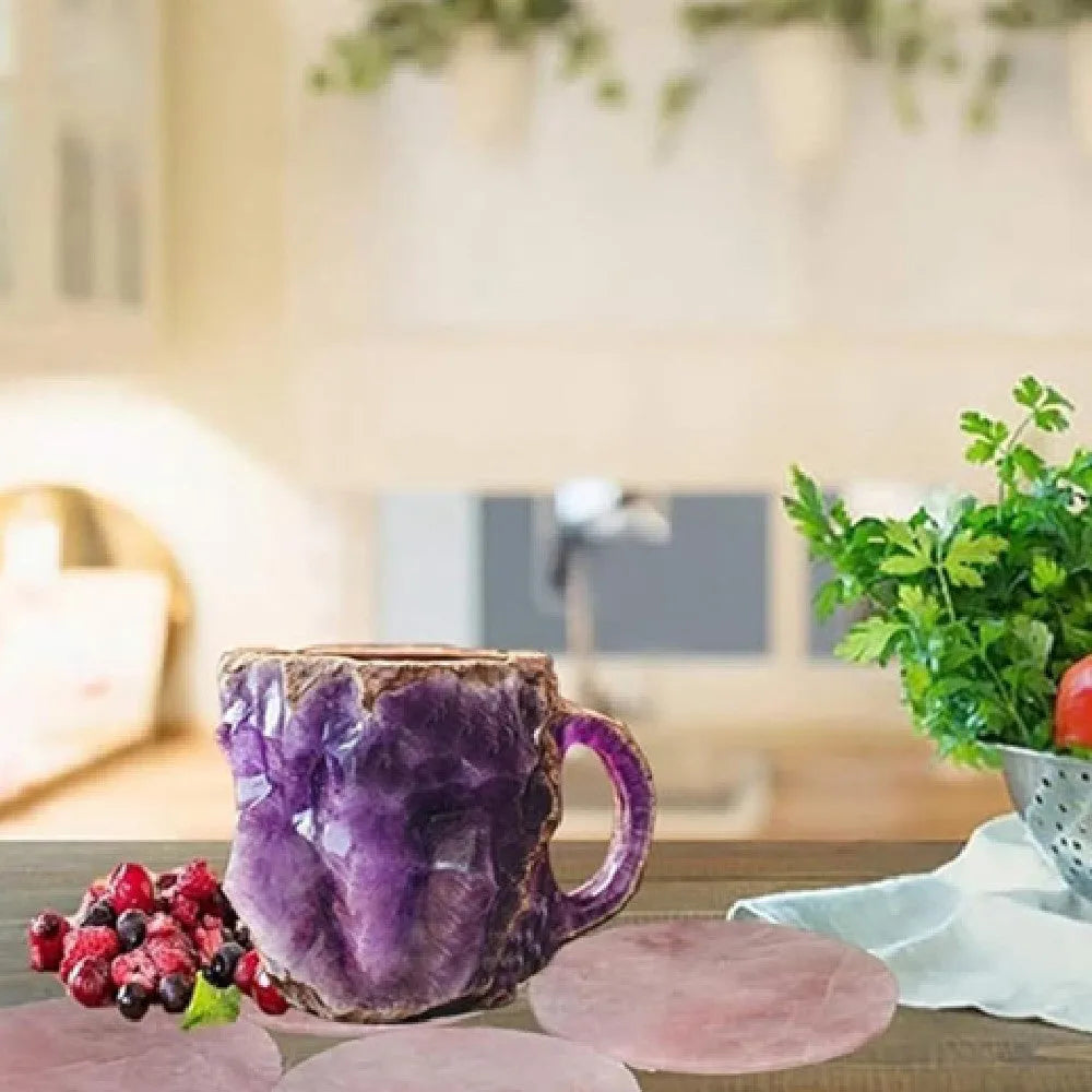 Purple resin coffee mug with handle showing crystal-like transparency on a table.