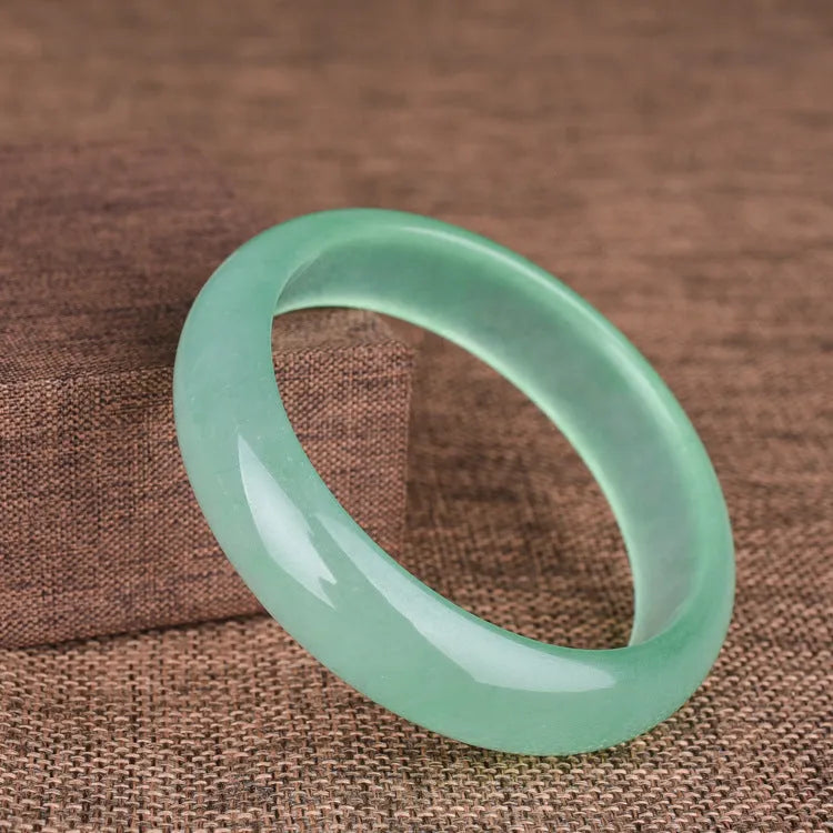 Women's quartz rock jade bracelet in oil cyan light green or blue colour with modern minimalist design