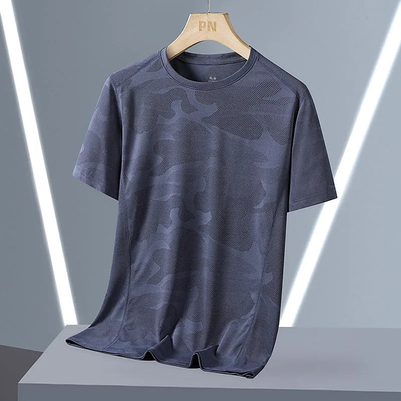 Men's camouflage pattern nylon summer t-shirt with round neck and short sleeves in loose fit.