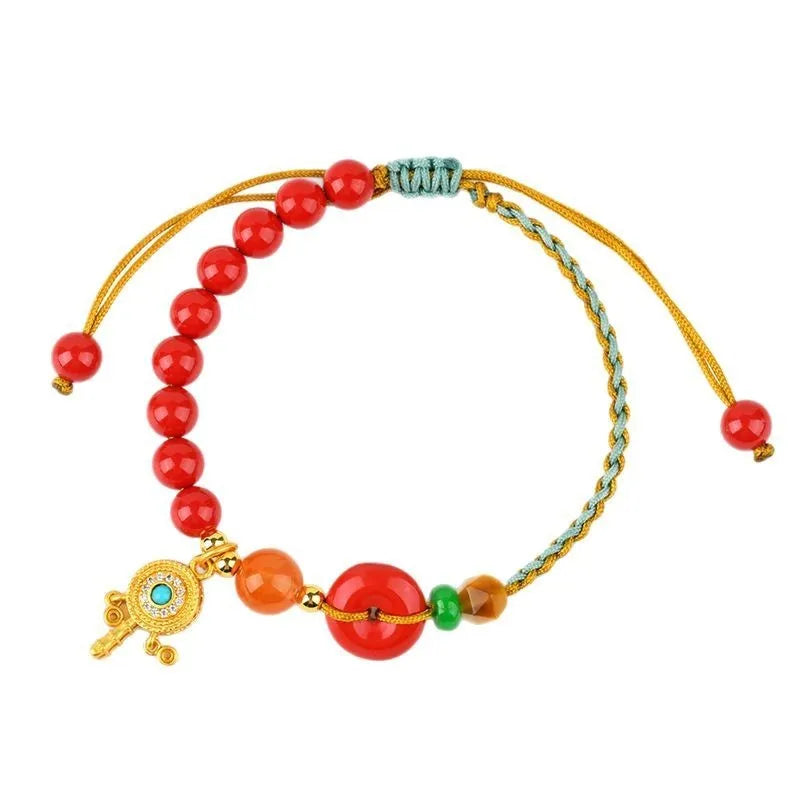 Women's cinnabar peace buckle bracelet in emperor red sand colour with hand-woven national style geometry design