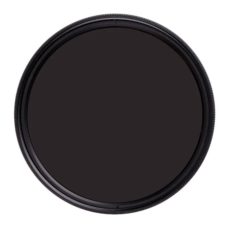 ND8 neutral density camera filter with aviation aluminium frame shown next to a lens.