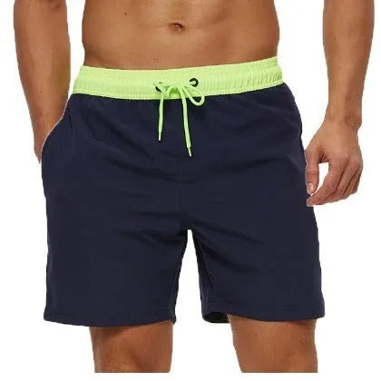 Men's blue stitching waist athletic shorts with drawstring and zipper pockets laid flat.