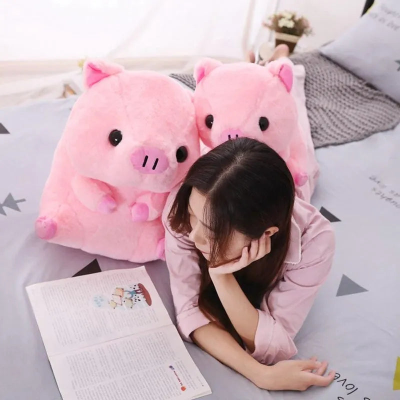 Brown boba milk tea plushie soft toy shaped like a cup with fruit, sitting as a cushion.
