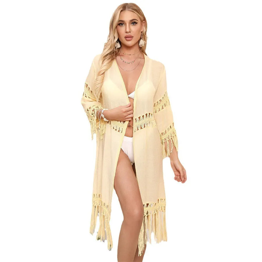 Hand-crocheted acrylic beach cover-up cardigan with tassel detail in water green colour.