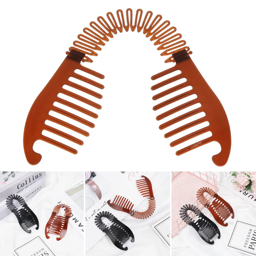 Retro fish-shaped hair claw clip in black with metal accents and adjustable hairband on a flat surface