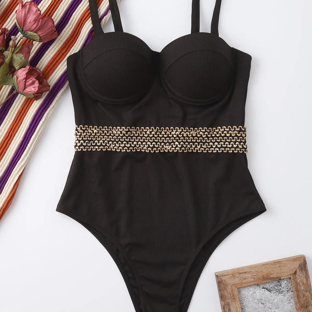 Black women's one-piece swimsuit with an adjustable shoulder strap on a mannequin
