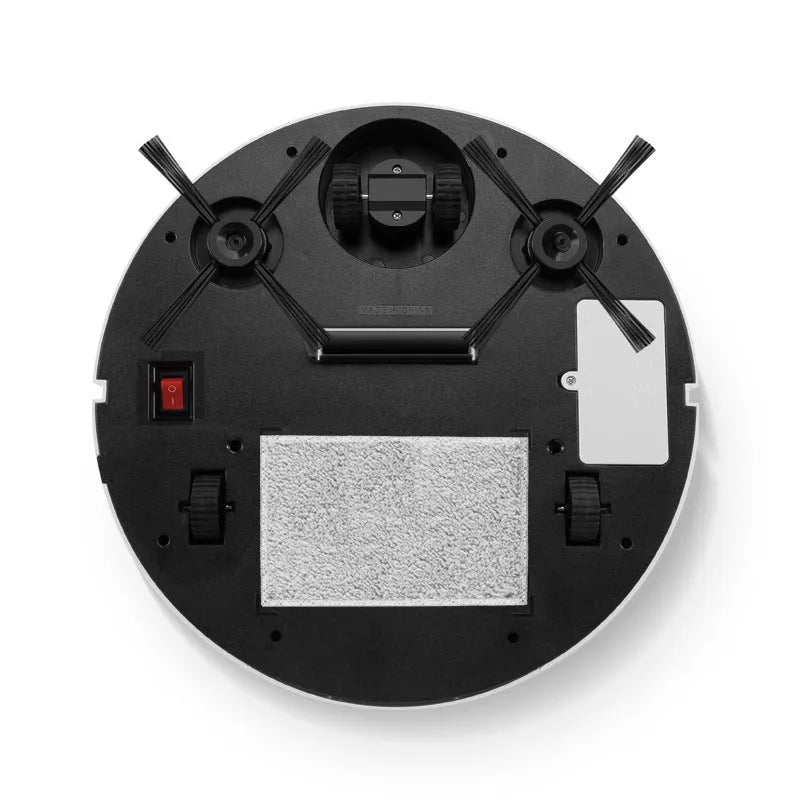 Automatic sweeping robot cleaner on a wooden floor, showing its square design and low profile.