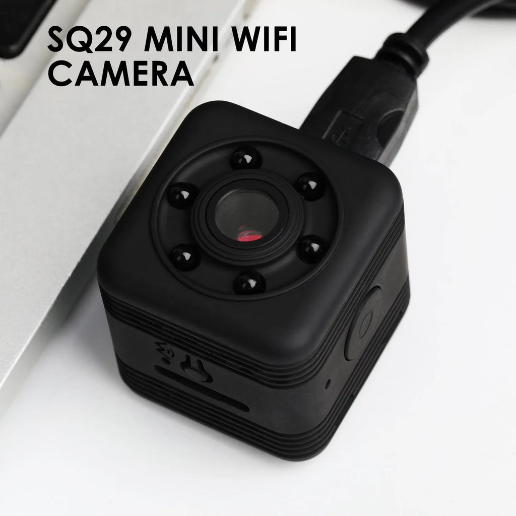 Black SQ29 waterproof sports camera showing Micro USB port and TF card slot for extended recording.