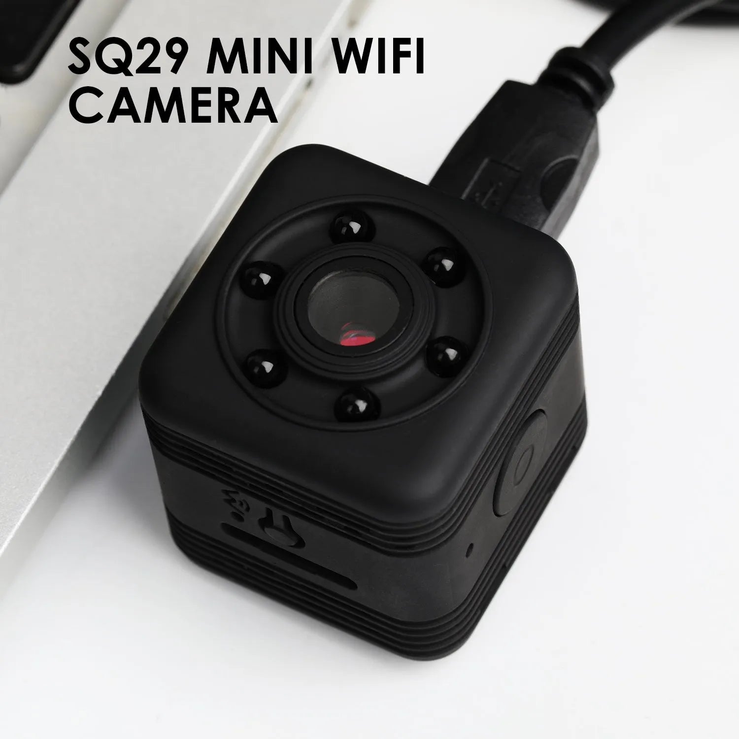 Black SQ29 waterproof sports camera showing Micro USB port and TF card slot for extended recording.
