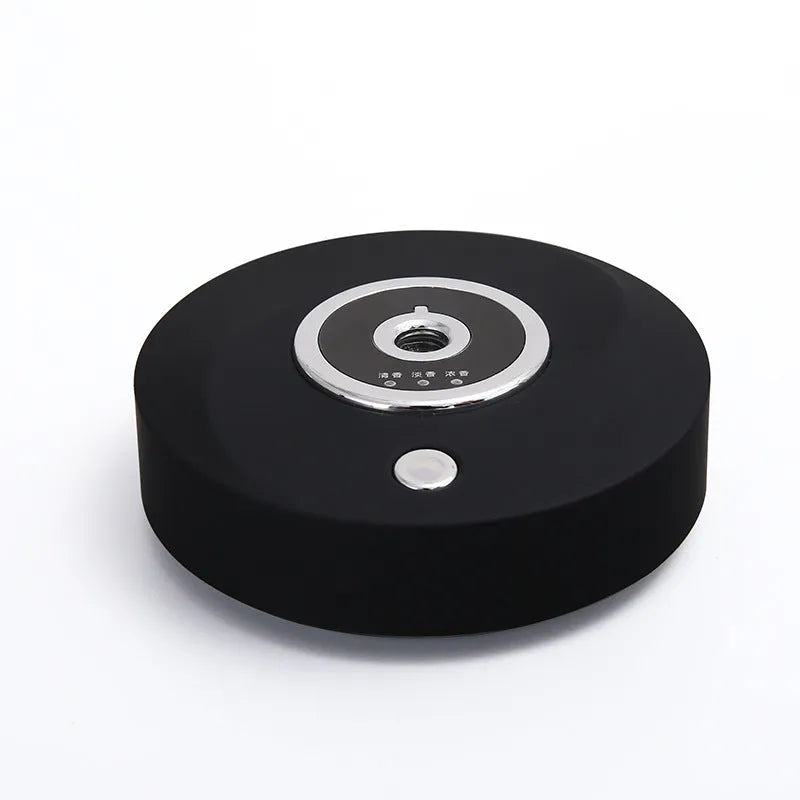 USB-powered plastic car fragrance diffuser in black, grey, or white with anti-slip pad and charging cable.