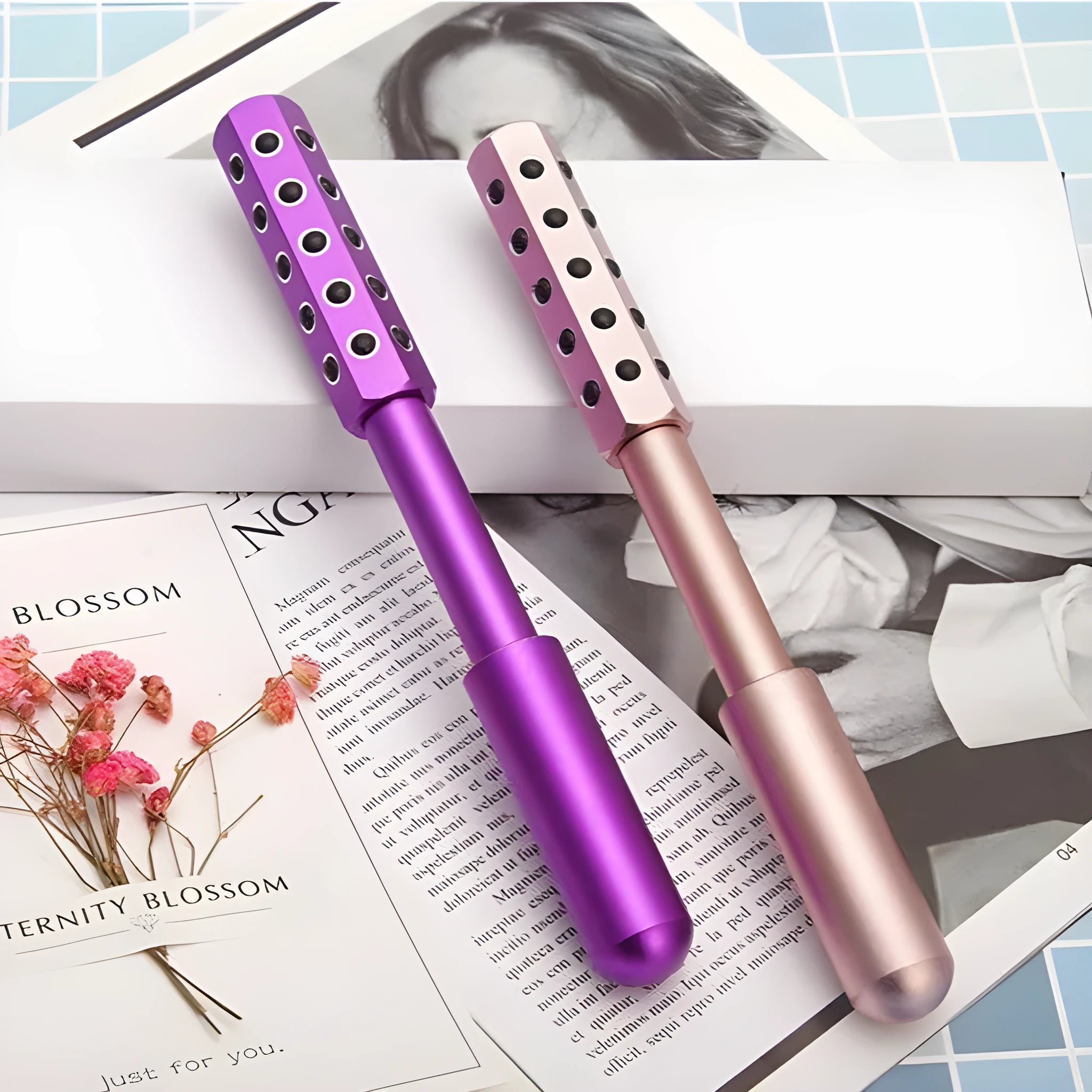 Purple germanium particle facial massage roller approximately 193mm long
