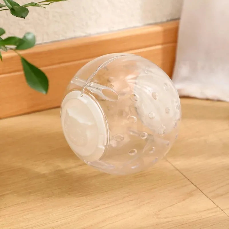 Clear ABS plastic cat slow feeding ball with treat dispenser holes