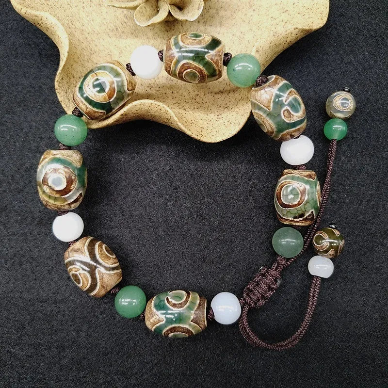 Green agate ethnic bracelet with hand-woven Tibetan beads and geometric patterns