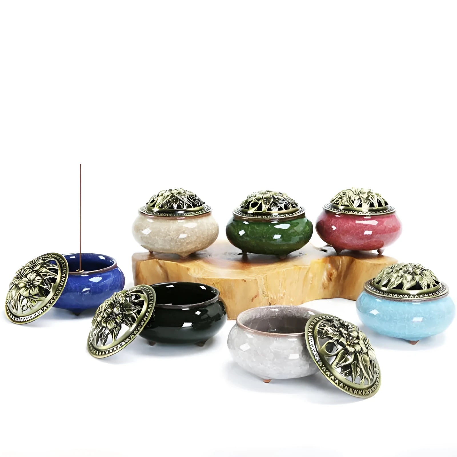 Retro ceramic incense burner in assorted glaze colours on a tabletop