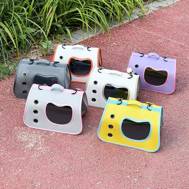 Medium capacity pet outing bag in Oxford cloth available in six colour options with crossbody carrying strap