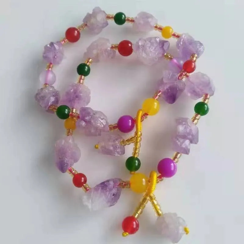 Natural style amethyst bead bracelet for women with a fu character charm.