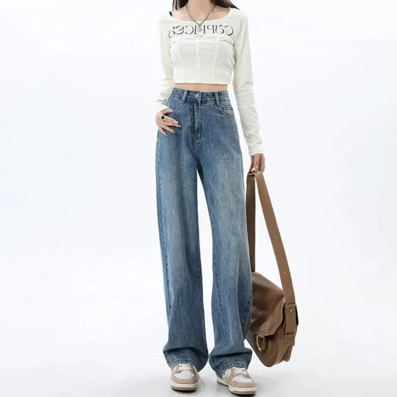 Women's retro blue high-waisted wide-leg jeans with a straight-leg cut on a hanger.