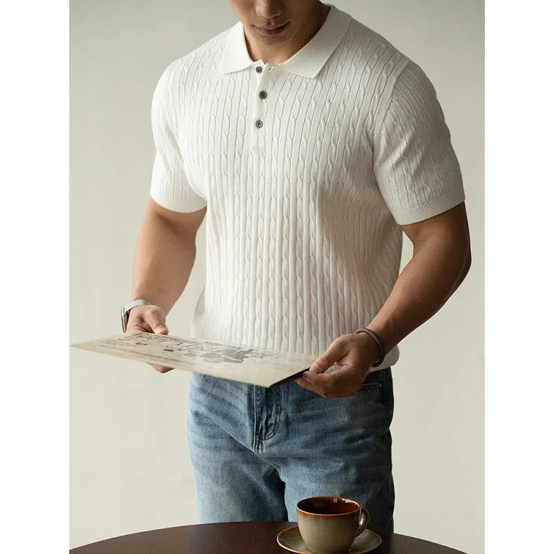 Men's khaki short sleeve business top laid flat, showing collar and button detail.
