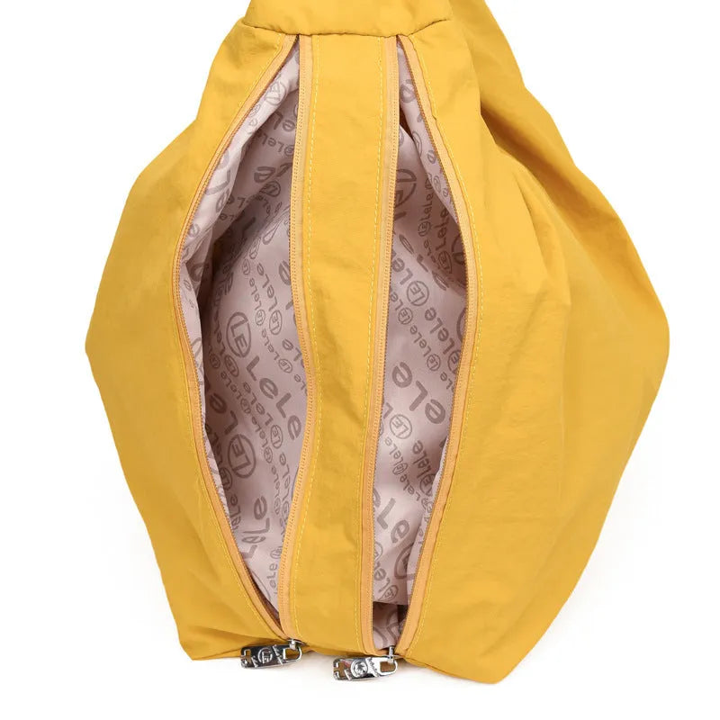 Women's heart-shaped nylon underarm bag in black, yellow, khaki, or blue colours with large capacity