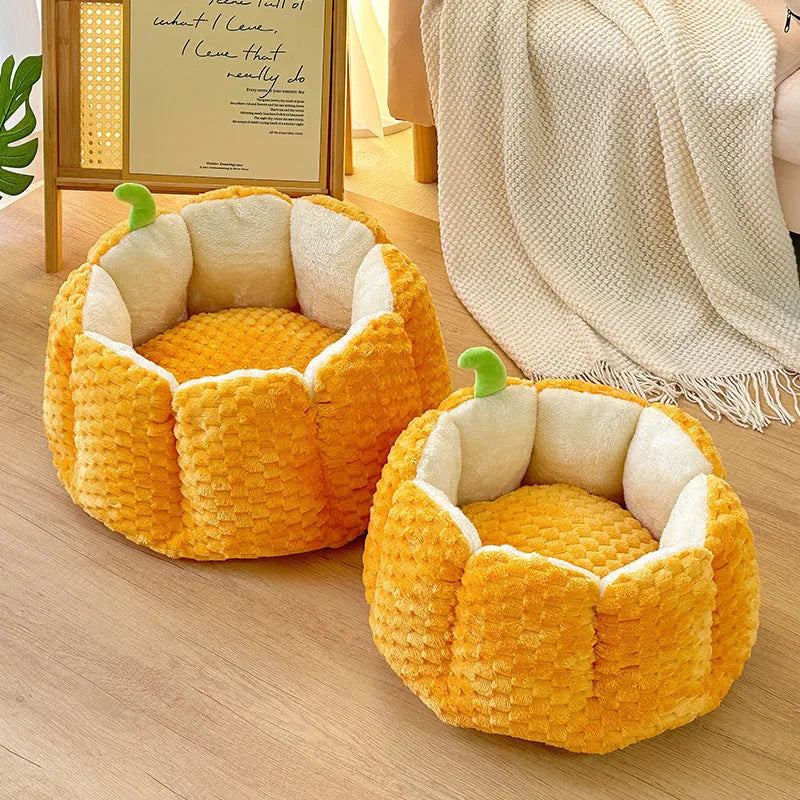 Pumpkin-shaped pet bed with raised sides and cotton filling for cats and small dogs